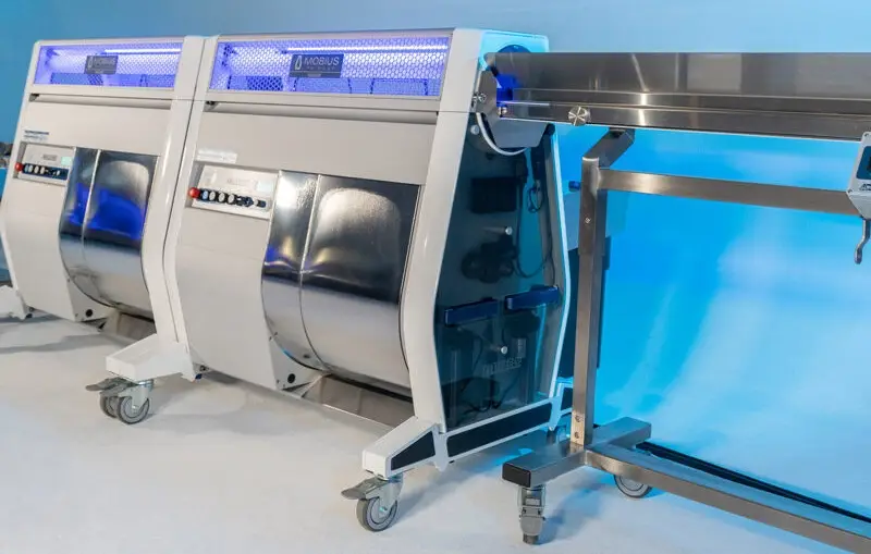 Mobius M108S commercial trimming machine processing dry flower at scale