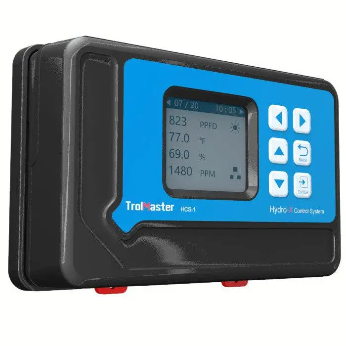 TrolMaster Hydro-X environmental controller with temperature humidity sensor mounted at canopy level in grow room
